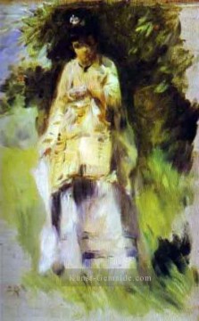  Renoir Werke - Frau  die von einem Baum Pierre Auguste Renoir